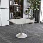 Table à manger carrée en résine avec pied central en acier blanc